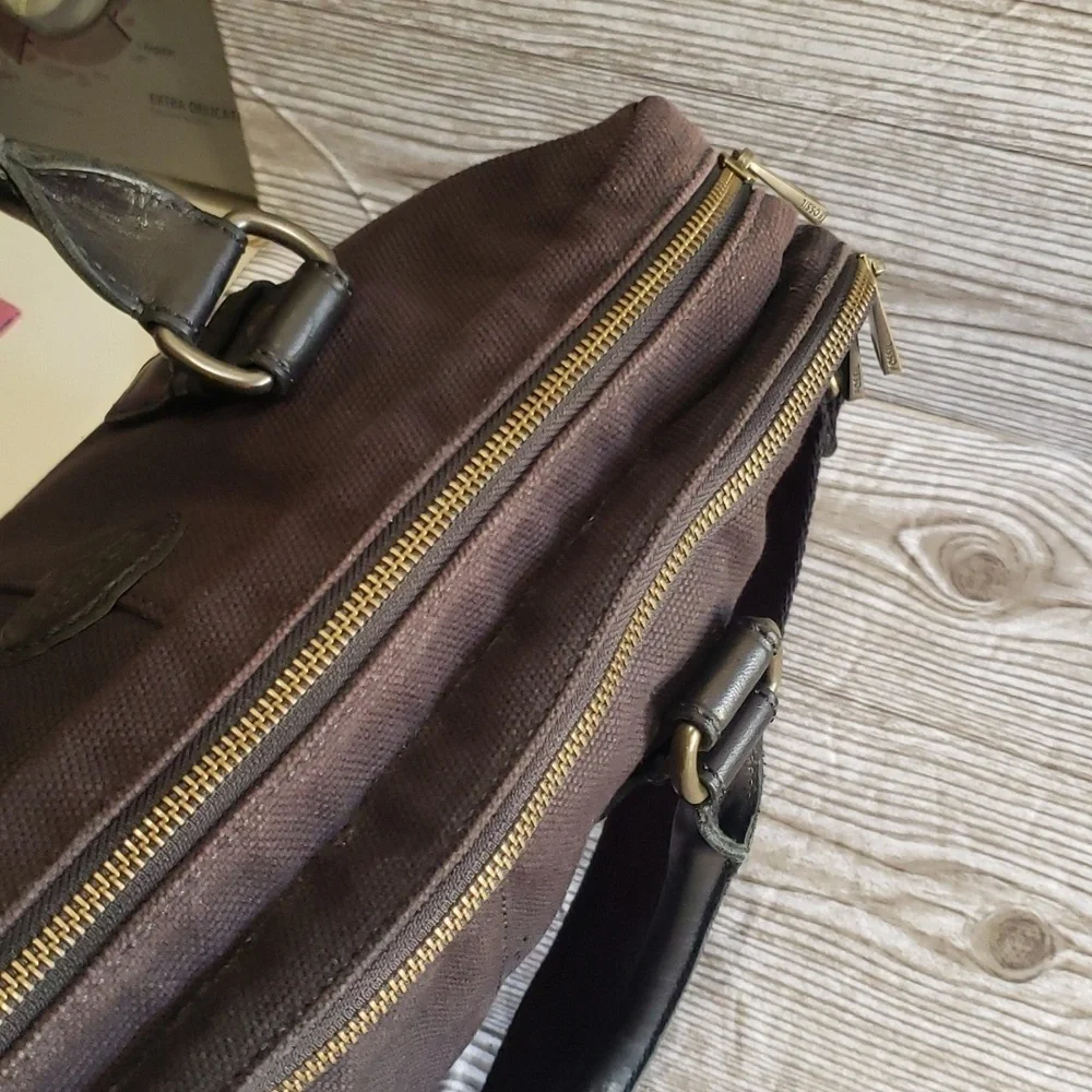 Fossil black canvas messages bag